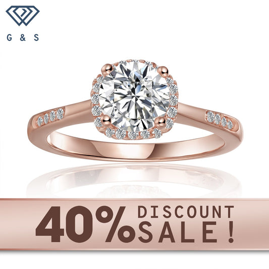 Modern halo engagement ring featuring a 1.00ct moissanite, set in 9ct rose gold with a contemporary halo design.