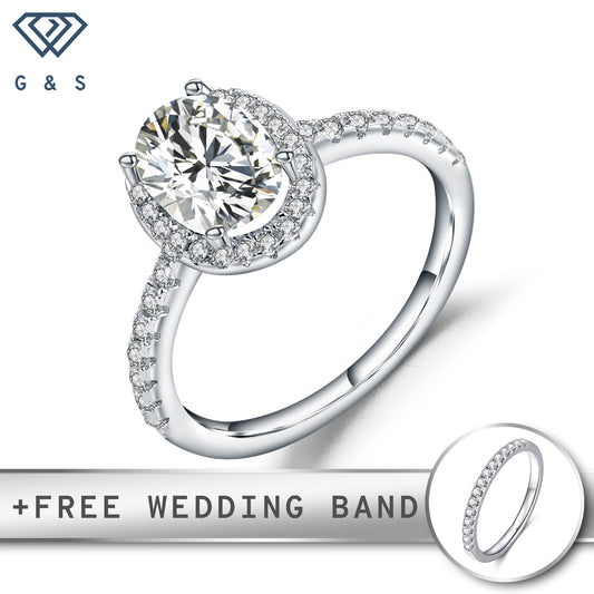 A classic engagement ring featuring a sparkling 1.00ct oval-cut moissanite surrounded by a delicate halo, set in polished sterling silver.