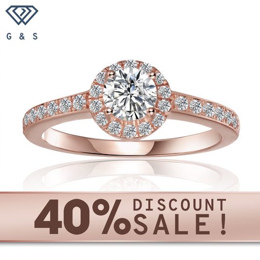 Pave halo engagement ring with a 0.50ct moissanite, set in 9ct rose gold with a delicate pave halo.