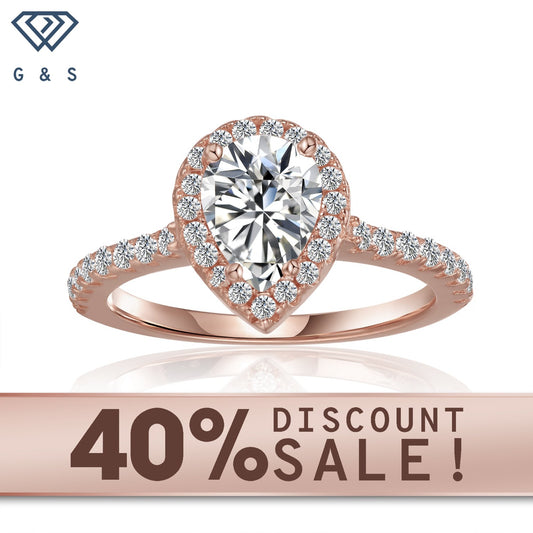 Pear-shaped halo engagement ring with a 1.25ct moissanite, set in 9ct rose gold.