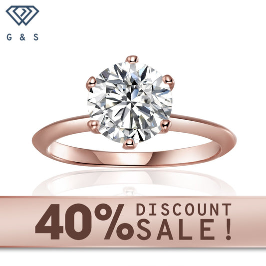 Classic solitaire engagement ring with a 2.00ct moissanite in a 6-prong Tiffany setting, crafted in 9ct rose gold.