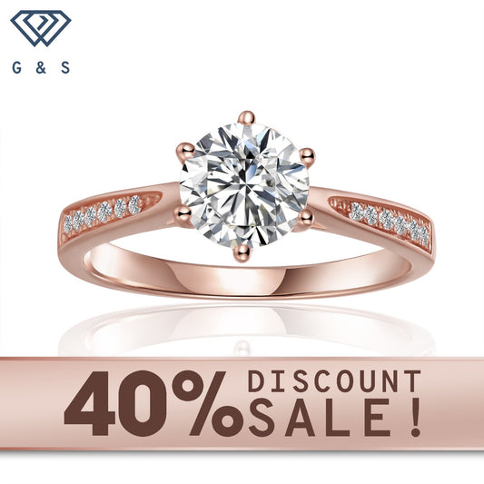 Tapered pave engagement ring featuring a 1.00ct moissanite, set in 9ct rose gold with a tapered pave setting.