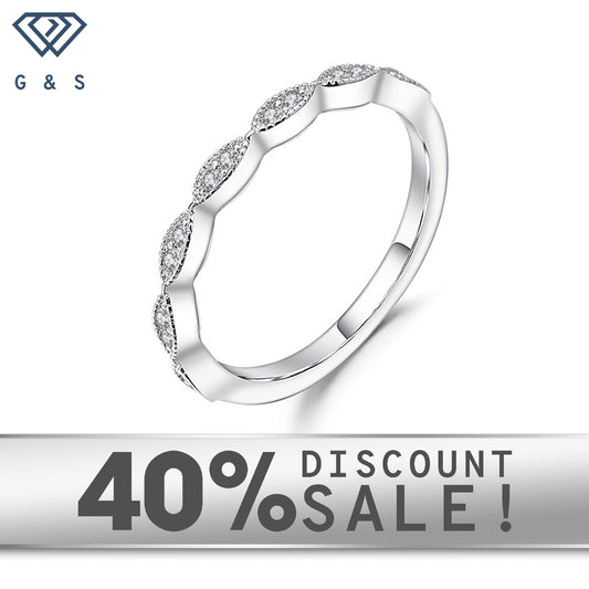 Elegant wedding bands in 9ct white gold with a vintage design and sparkling moissanites.